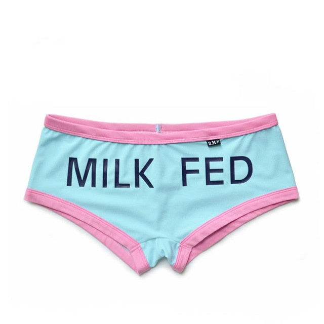 Light blue boxer briefs with pink trim and a large “MILK FED” front print