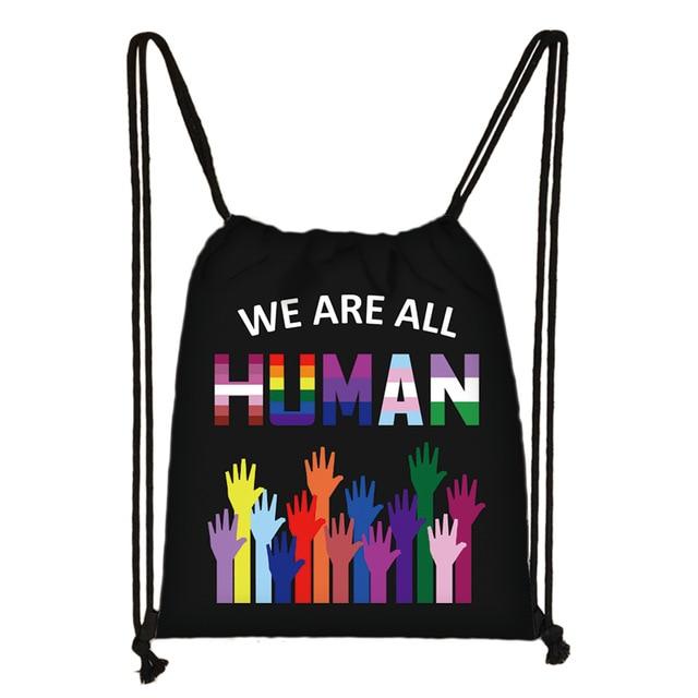  We Are All Human Drawstring Bag by Queer In The World sold by Queer In The World: The Shop - LGBT Merch Fashion