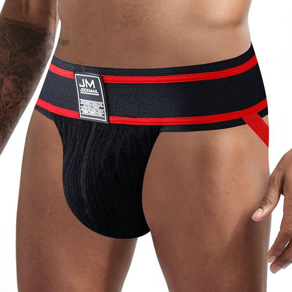Close-up of a black athletic jockstrap with red trim and a front pouch