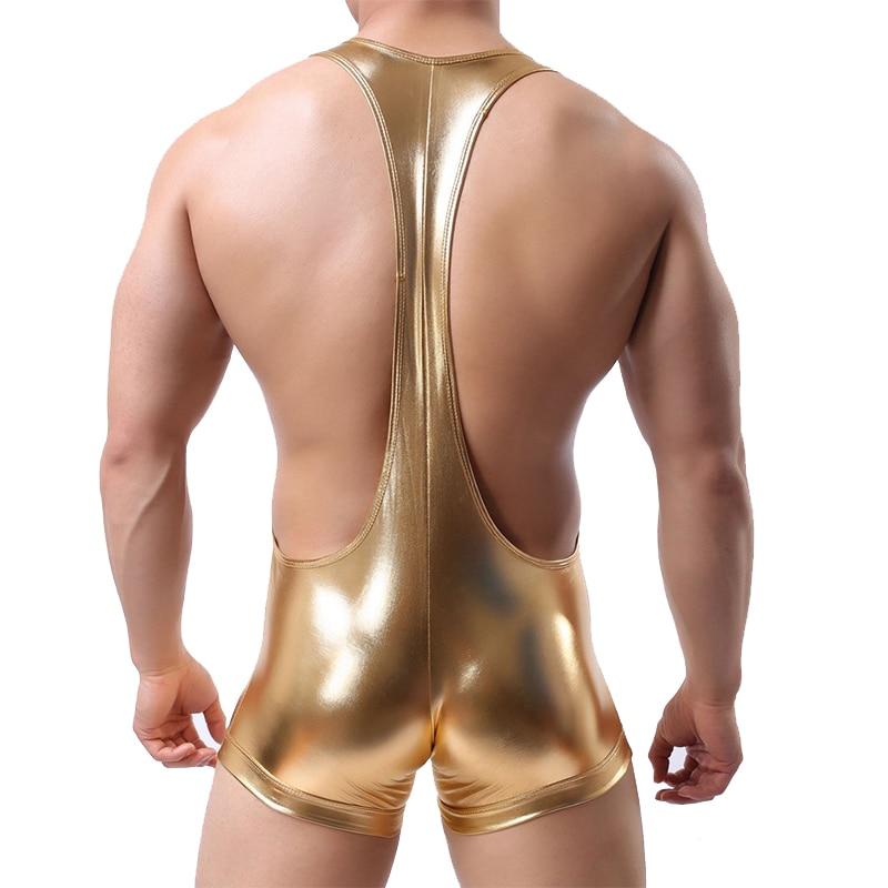 Rear view of a model wearing a metallic gold faux-leather bodysuit with an open back