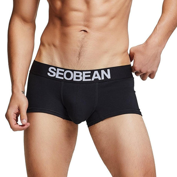 Model wearing black boxer briefs with a wide SEOBEAN logo waistband
