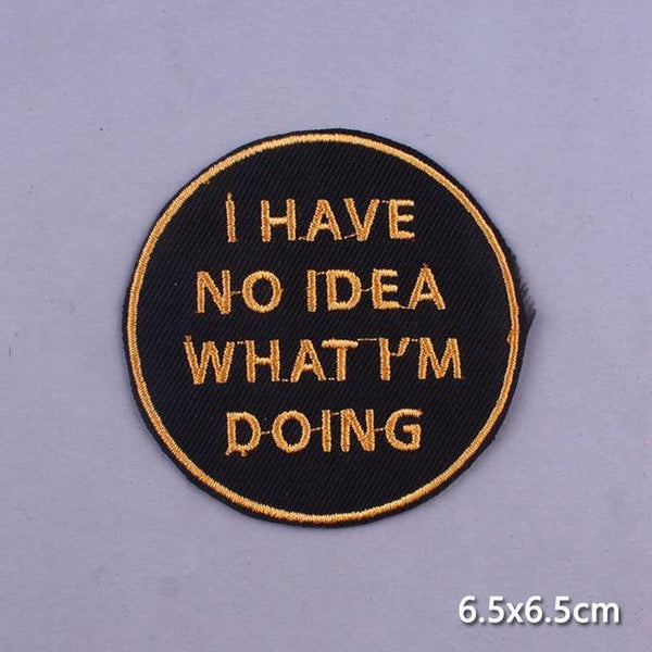 Round black embroidered iron-on patch reading “I HAVE NO IDEA WHAT I’M DOING”