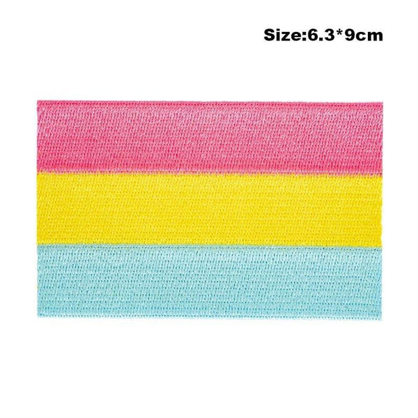 Close-up of a pink, yellow, and blue pansexual pride embroidered iron-on patch