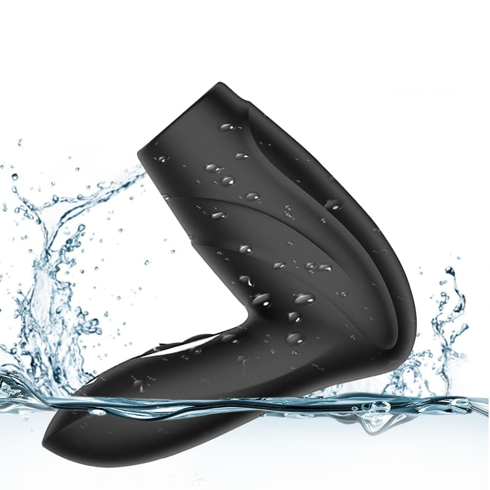 Black penis-sucking sex machine shown at an angle with water splashing around it