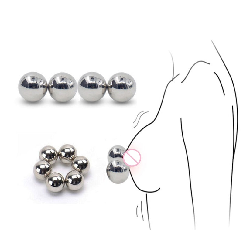 Silver magnetic nipple balls shown in pairs, a ring, and beside a line drawing of a breast
