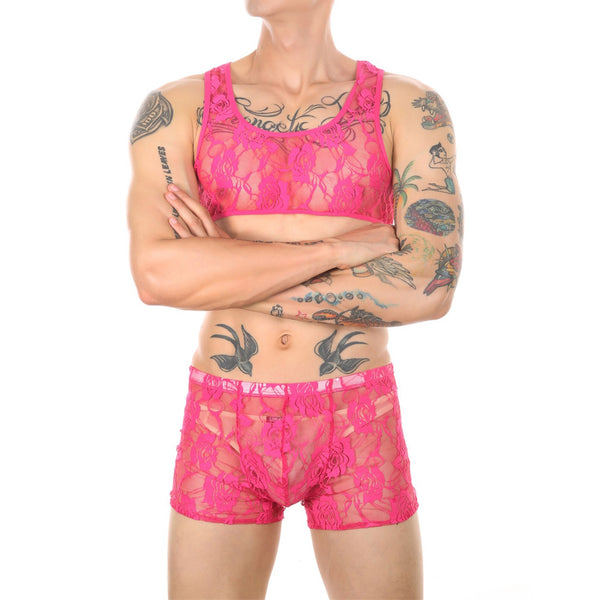 Model wearing a hot pink lace crop top and matching boxer shorts