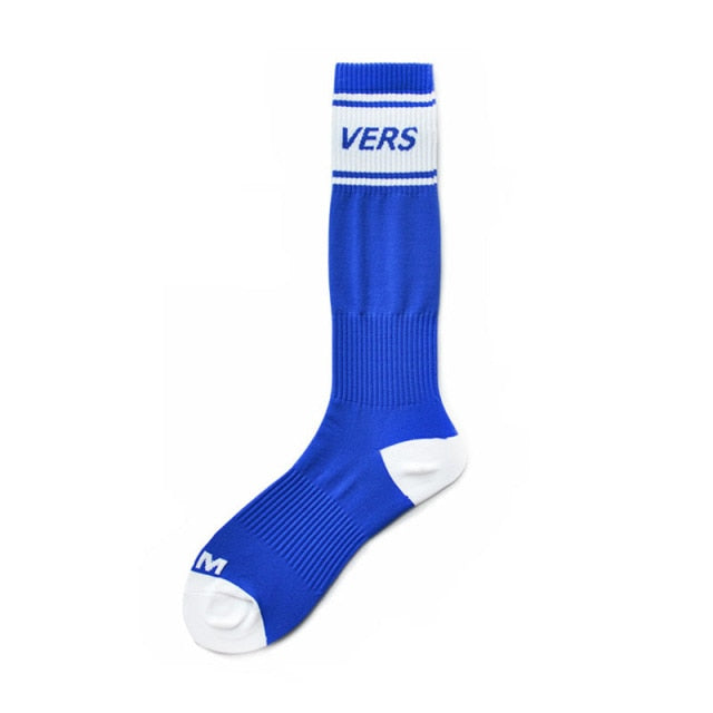 Blue crew sock with white toe and heel, striped cuff, and “VERS” lettering