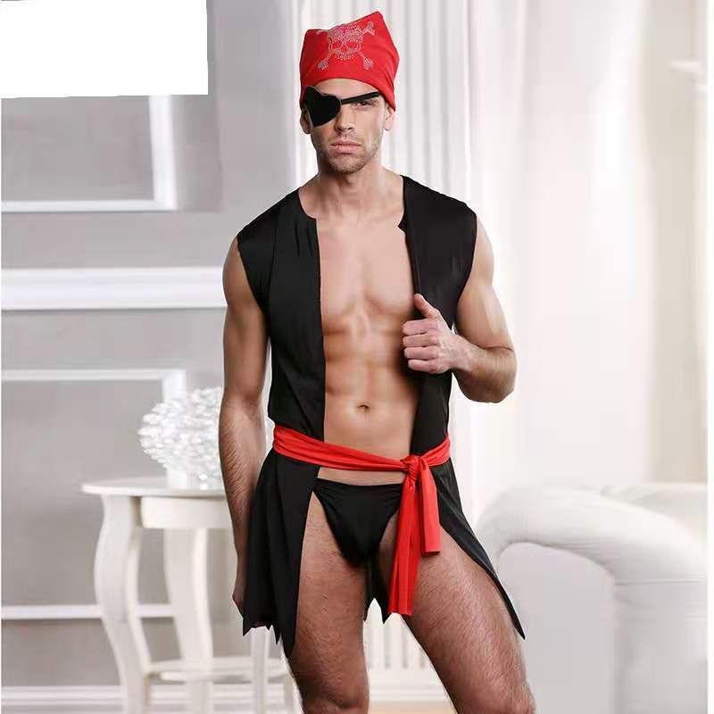 Gay pirate costume modeled with a black open vest, red sash, eyepatch, and red headscarf