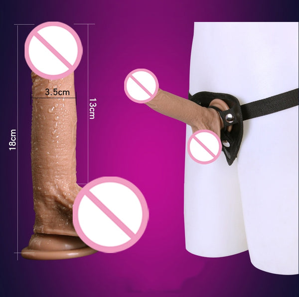 Realistic skin-tone dildo shown loose and mounted on a black strap harness, with size markings