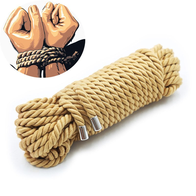 Coiled beige rope bondage kit with metal end caps beside an illustration of tied wrists