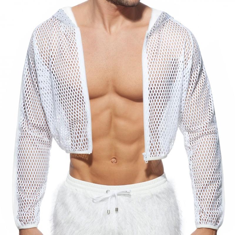 Front-facing model wearing a cropped white mesh zip hoodie over a bare torso