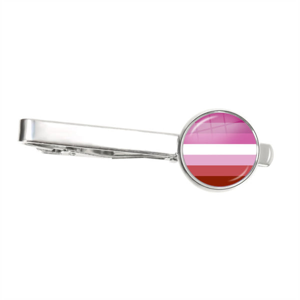 Silver tie clip with a round lesbian pride flag emblem, shown horizontally