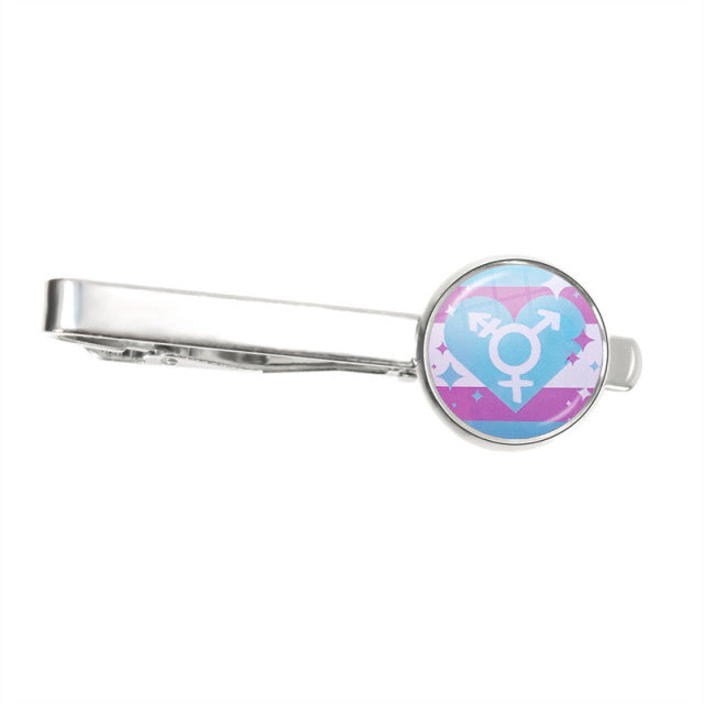 Silver tie clip with a round transgender symbol over pink and blue stripes