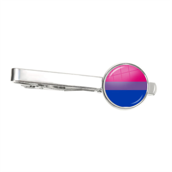 Silver tie clip with a round pink, purple, and blue striped emblem