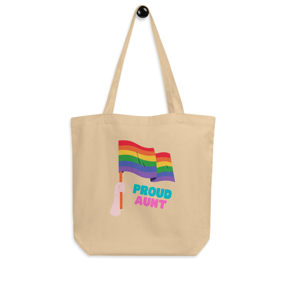 Oyster canvas tote bag with rainbow flags and the words “PROUD AUNT”
