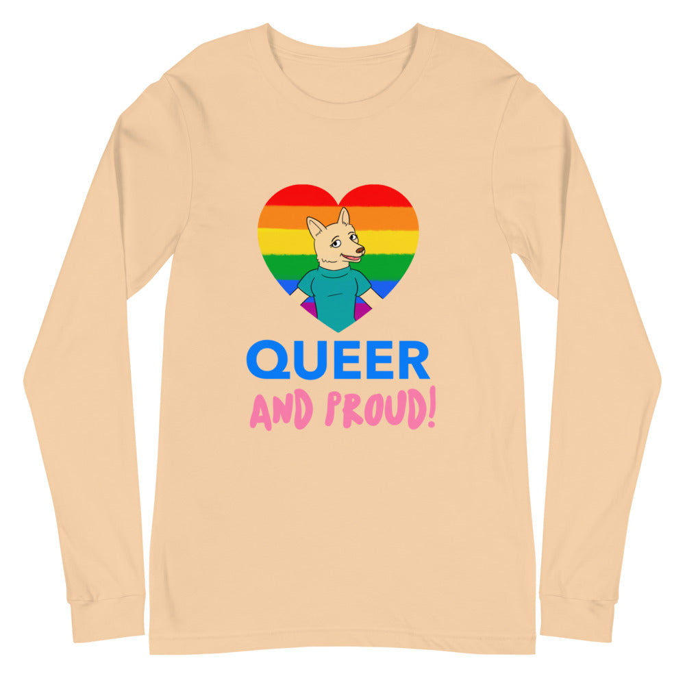 Front view of a sand-colored long-sleeve shirt reading “QUEER AND PROUD!” with a rainbow heart