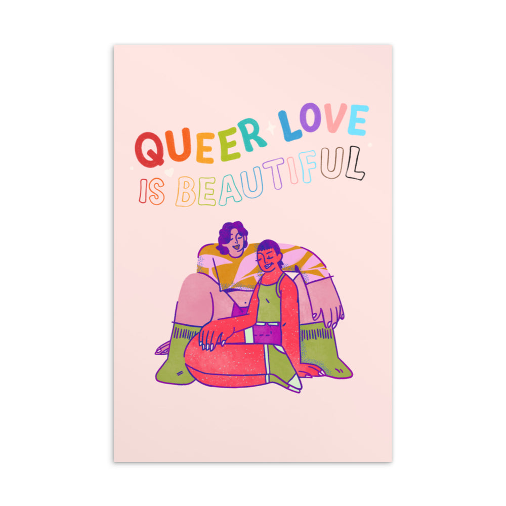 Pink postcard reading “QUEER LOVE IS BEAUTIFUL,” with two people cuddling on a couch
