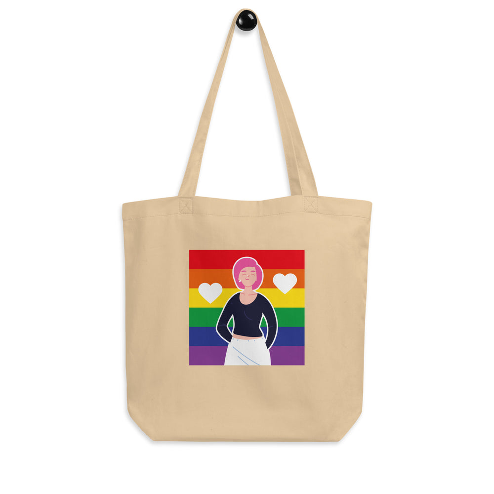 Natural canvas tote with rainbow stripes, two hearts, and an illustrated person on the front