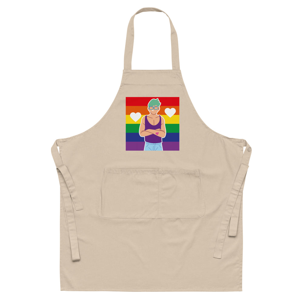 Front-facing beige apron with rainbow stripes, hearts, and an illustrated person on the chest