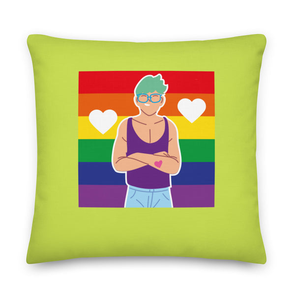 Lime-green square pillow with a rainbow-striped panel showing a person in glasses and two white hearts