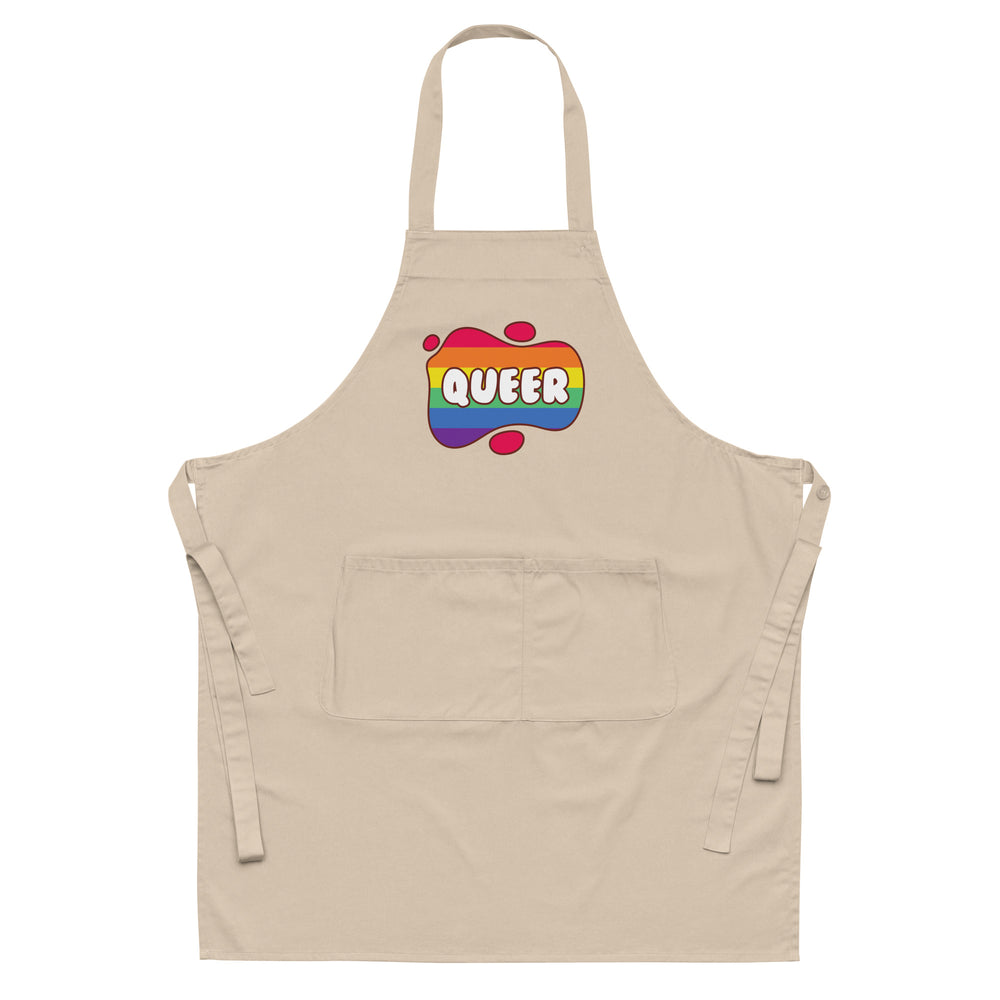 Front view of a beige apron with neck and waist ties, front pocket, and rainbow-striped QUEER graphic