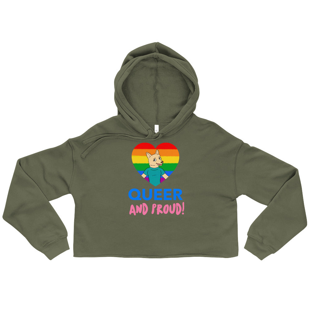 Front view of an olive cropped hoodie with a rainbow heart, cartoon dog, and “QUEER AND PROUD!” text
