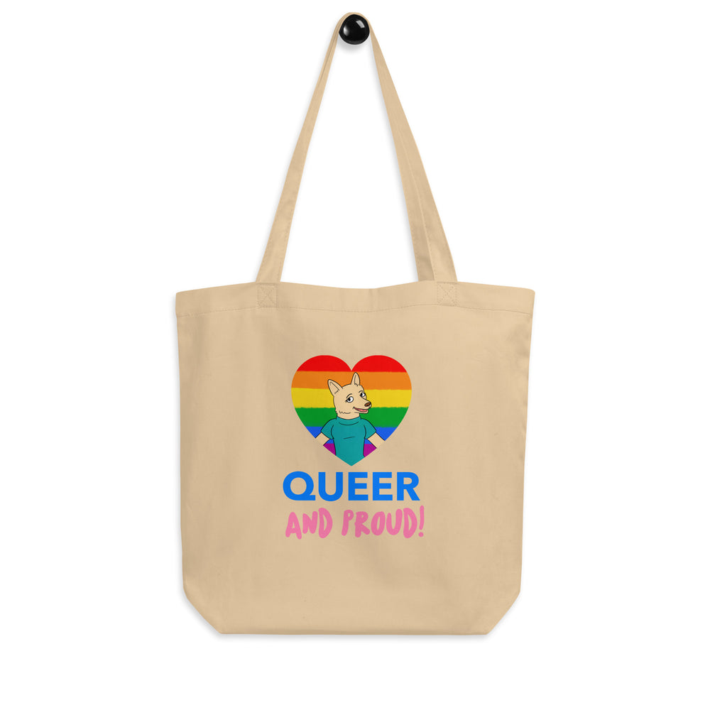 Oyster canvas tote bag reading “QUEER AND PROUD!” with a rainbow heart and cartoon dog