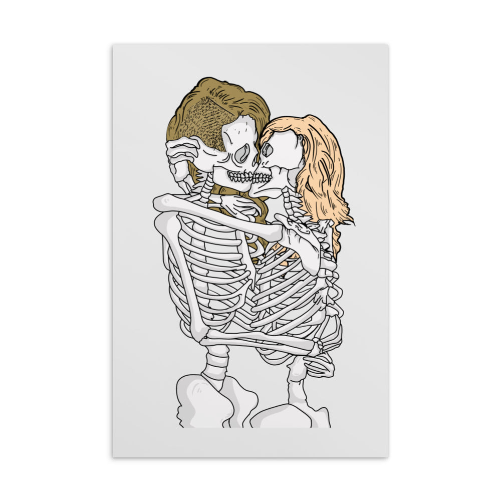Postcard illustration of two skeletons kissing and embracing, with brown and blond hair