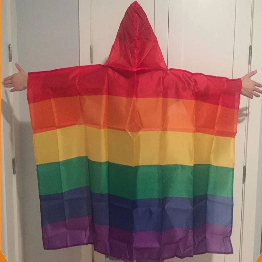 Rainbow body flag worn as a hooded cape with arms outstretched