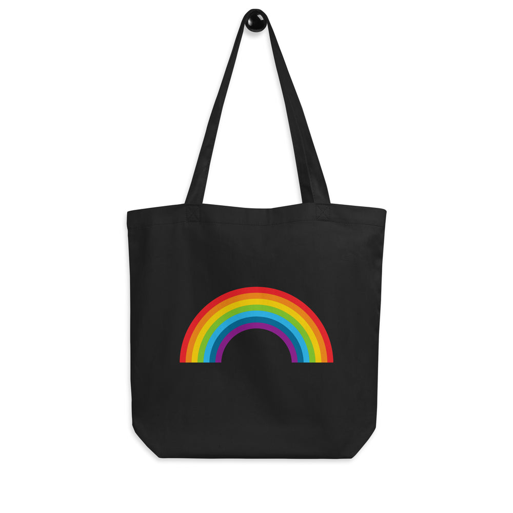 Front-facing black tote bag with a colorful rainbow arch and two long handles