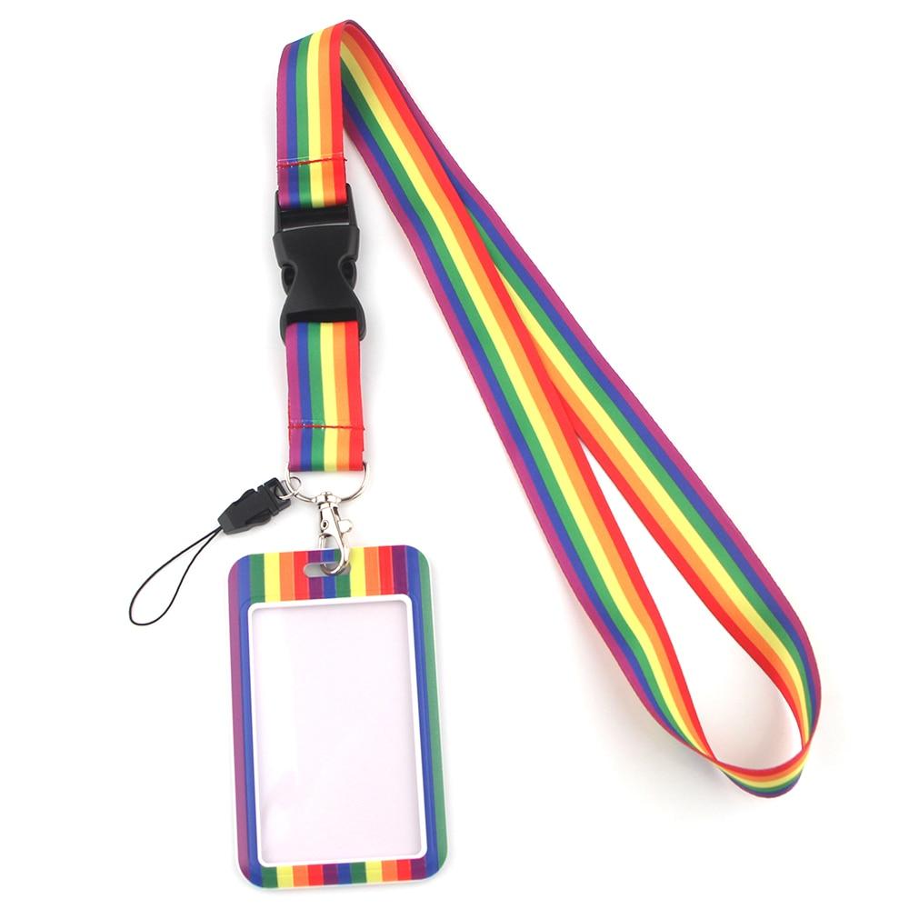 Rainbow Pride lanyard with black buckle, clear ID case, and detachable phone loop