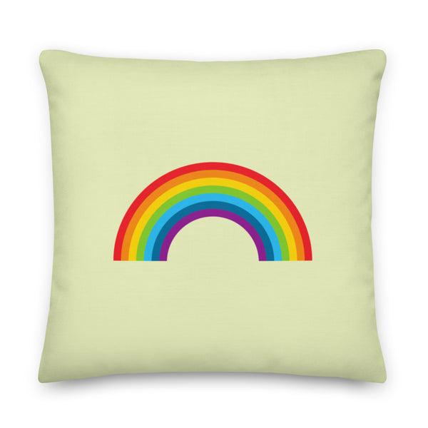 Square pale green cushion with a centered rainbow arch design