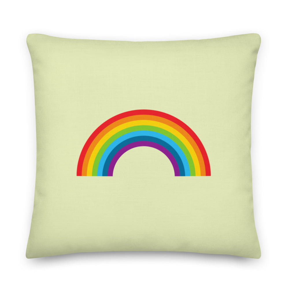 Square pale green cushion with a centered rainbow arch design