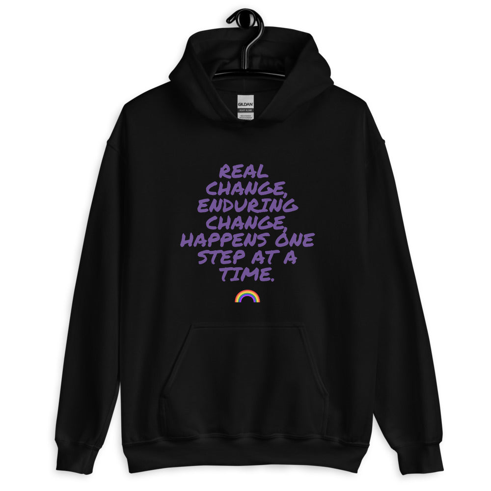 Front view of a black hoodie with purple text and a small rainbow graphic