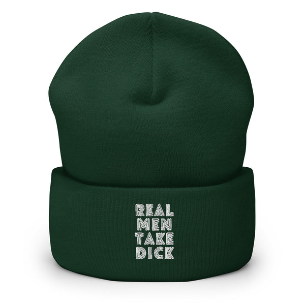 Front view of a dark green cuffed beanie reading “REAL MEN TAKE DICK” in white