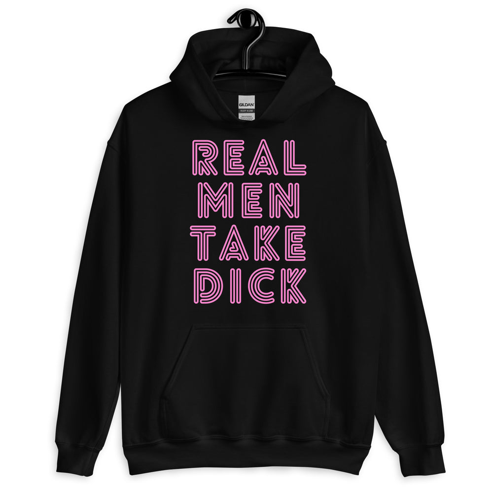 Front view of a black hoodie with pink text reading “REAL MEN TAKE DICK”