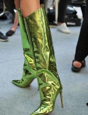 Metallic green thigh-high stiletto boots with pointed toes and high heels