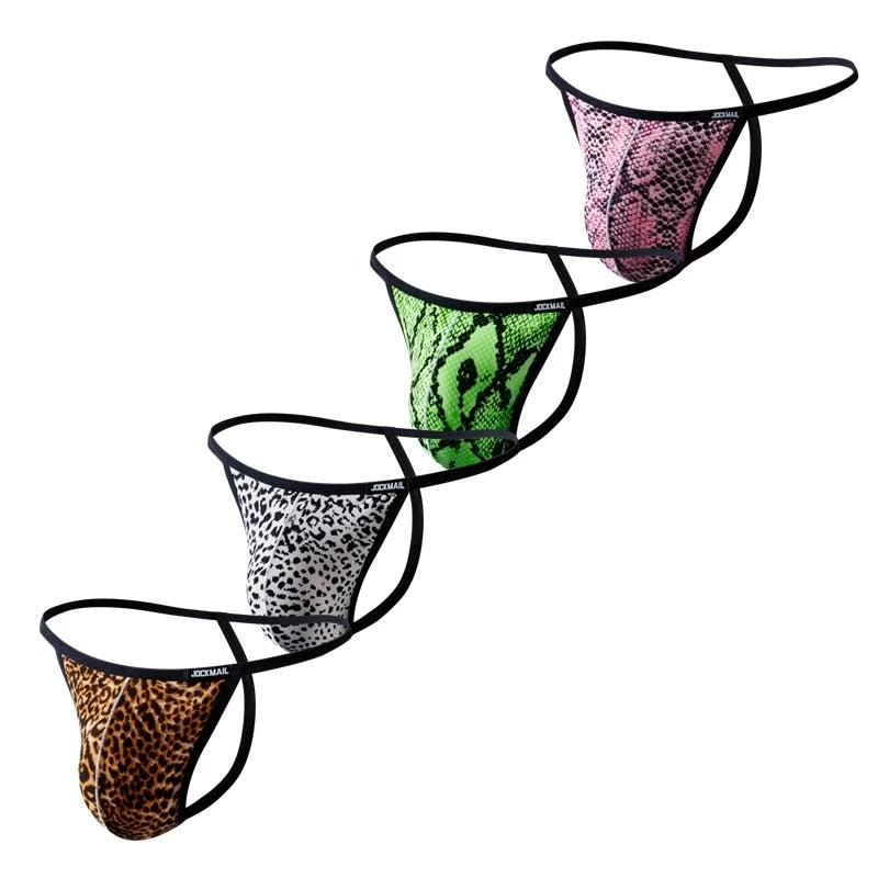 Four animal-print jockstraps arranged diagonally: brown, gray, green, and pink.