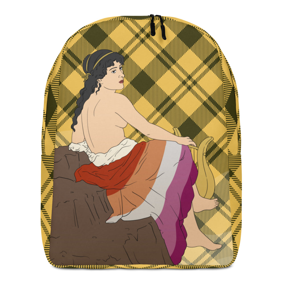 Front view of a yellow plaid backpack featuring a reclining woman with a lyre