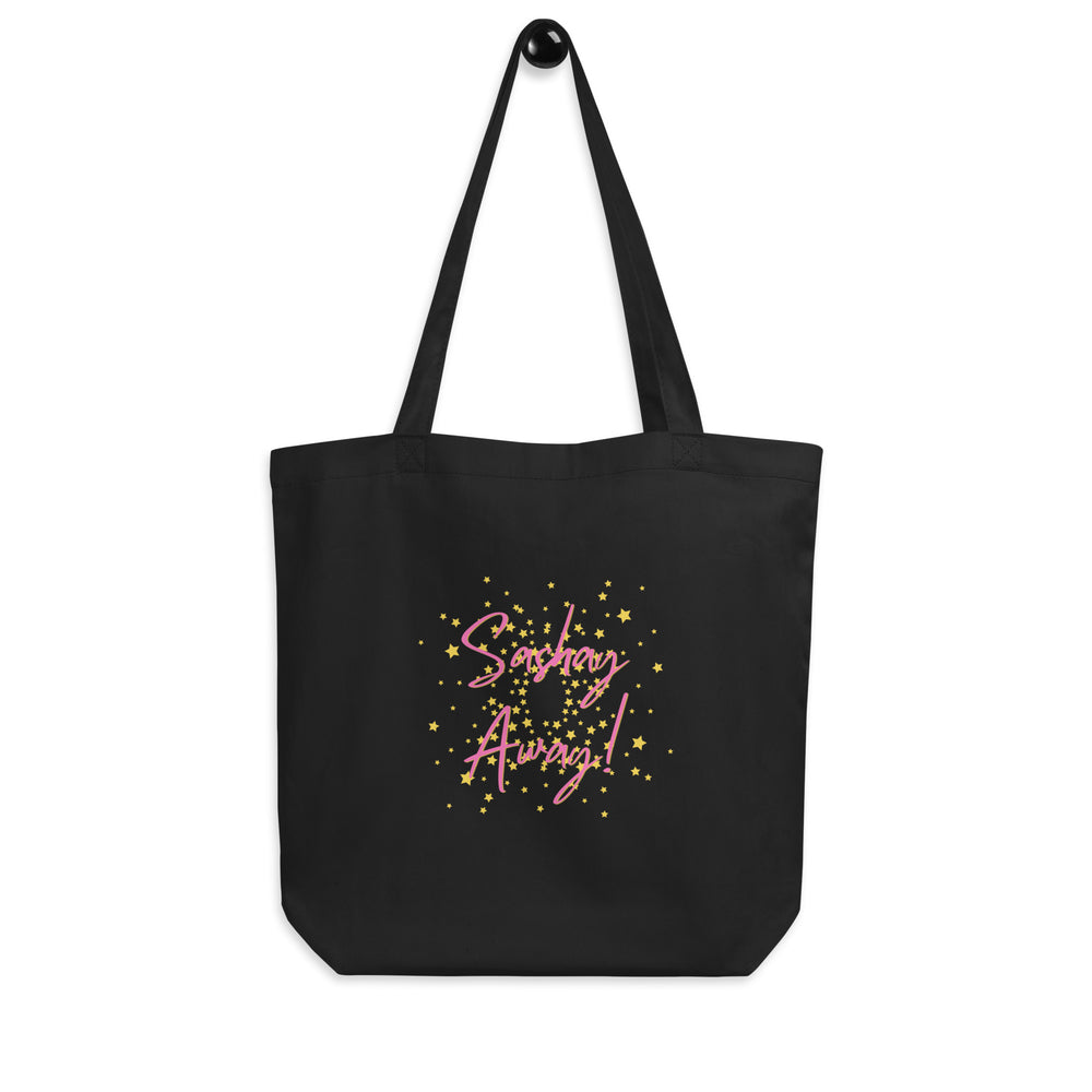 Front view of a black tote bag with pink “Sashay Away!” lettering and yellow stars