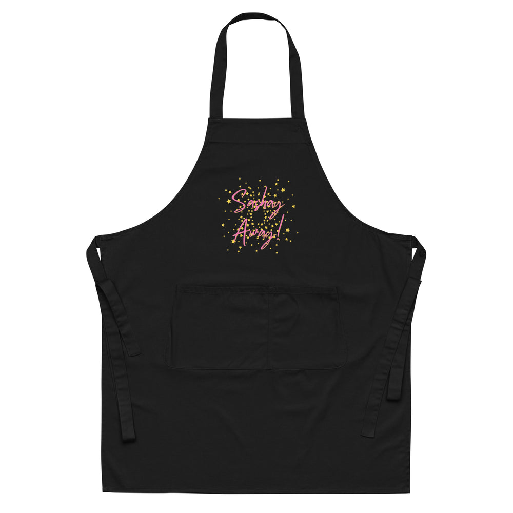 Front view of a black apron with pink “Sashay Away!” lettering and yellow stars