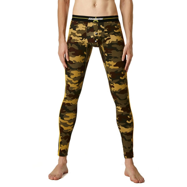 Camo-print full-length leggings with a black elastic waistband, modeled against a white background