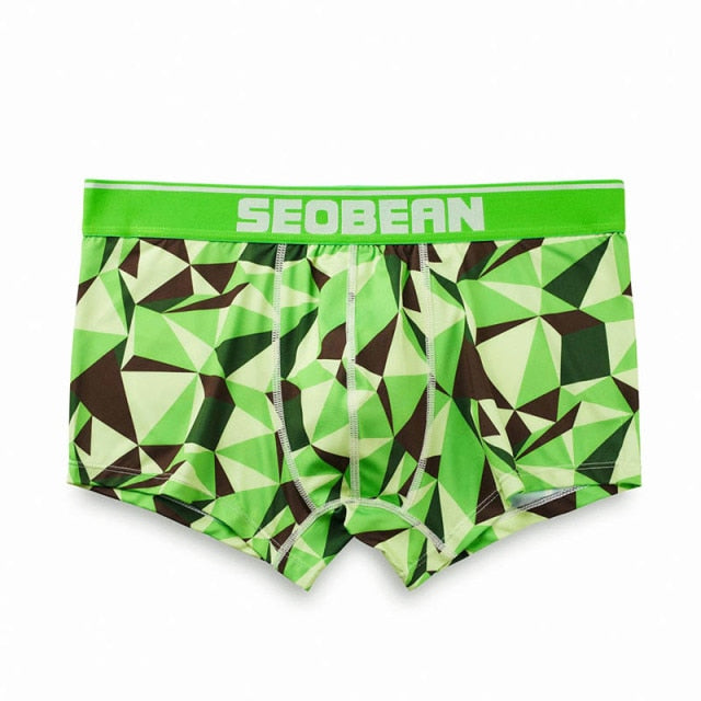 Front view of green geometric-print boxer briefs with “SEOBEAN” on the waistband