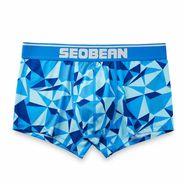 Front view of blue geometric-print boxer briefs with a SEOBEAN waistband
