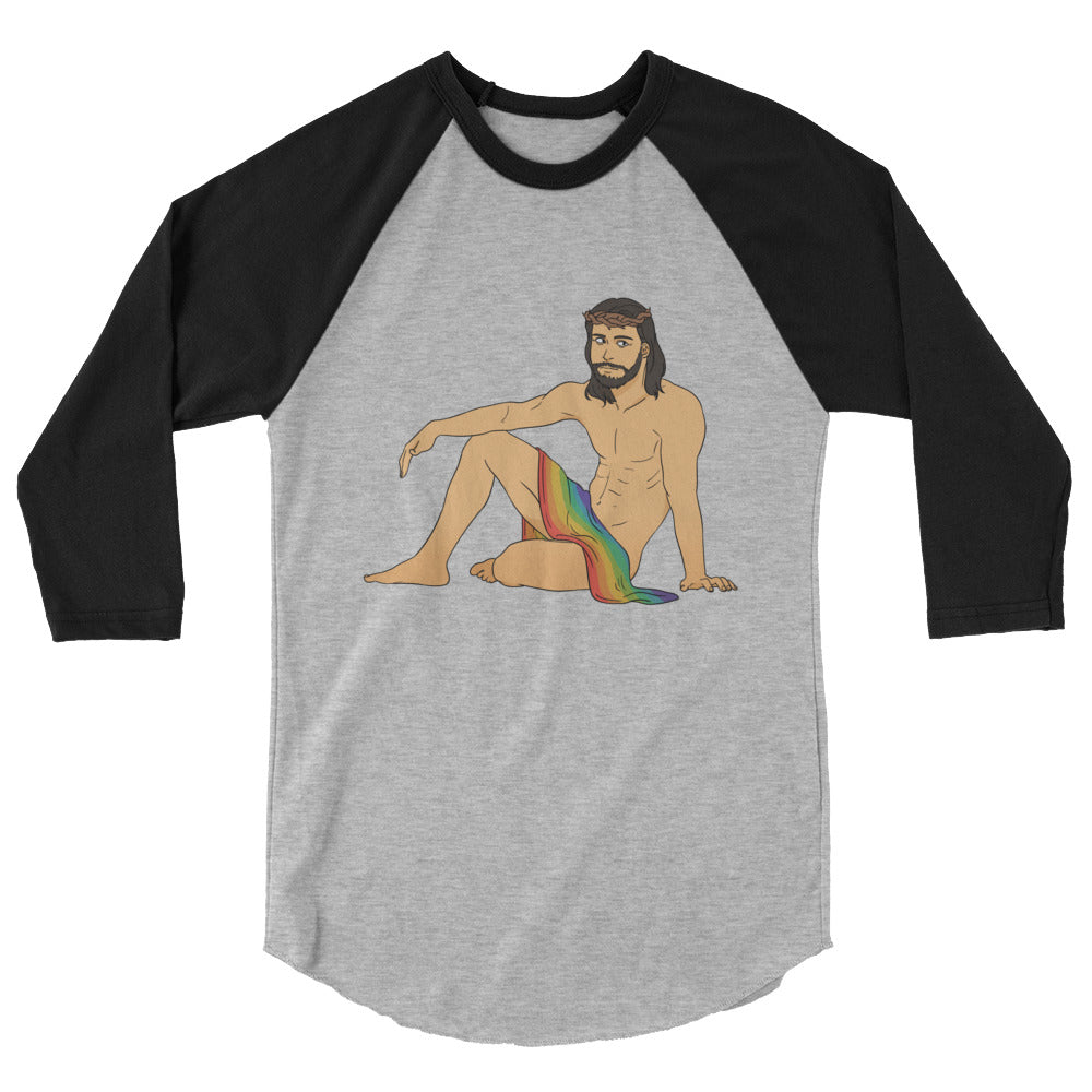 Gray raglan shirt with black three-quarter sleeves and a seated, shirtless bearded Jesus illustration draped in a rainbow...