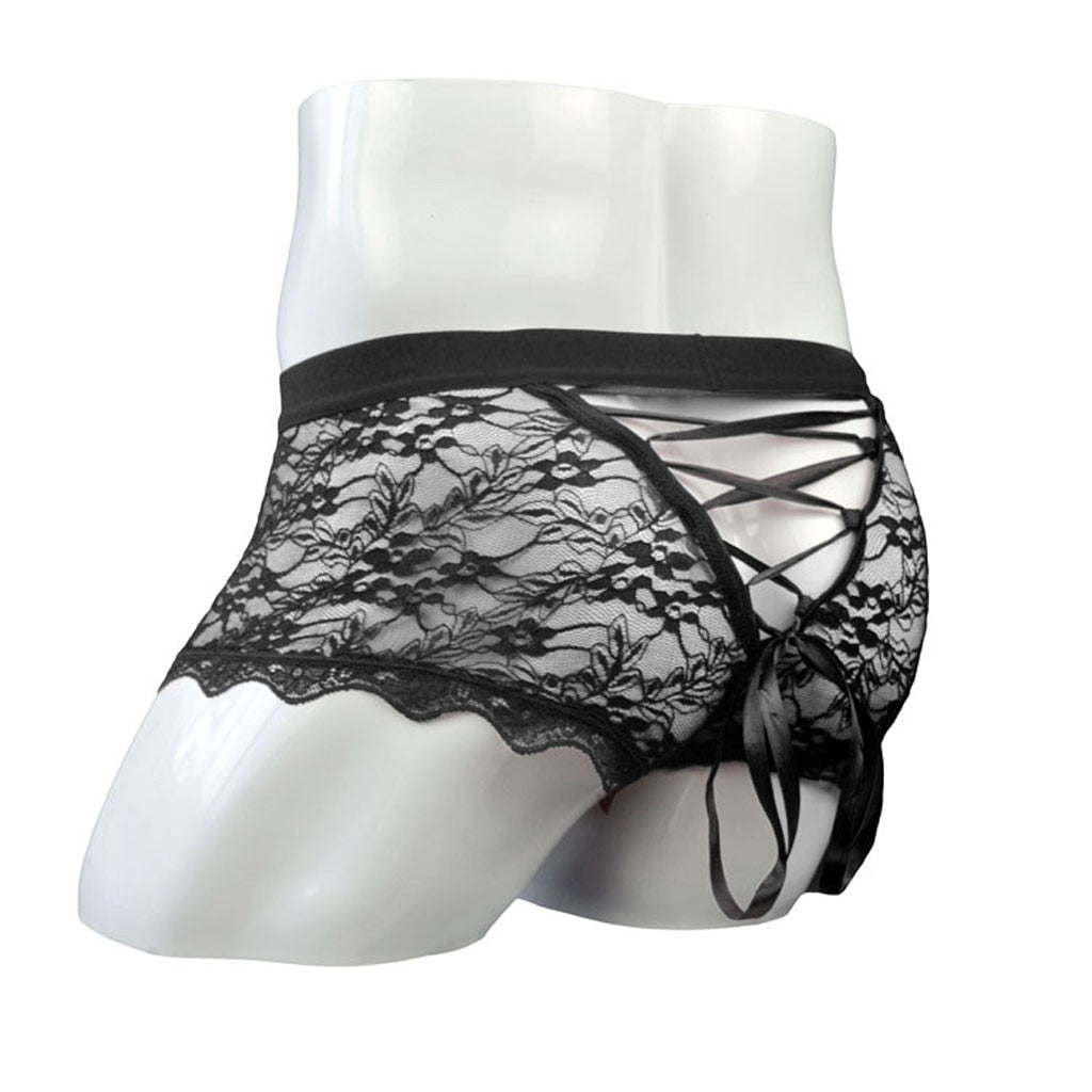 Black lace briefs on a mannequin, shown from the rear with crisscross lacing and a bow