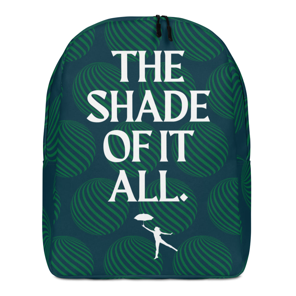 Front view of a dark teal backpack reading “THE SHADE OF IT ALL” in white