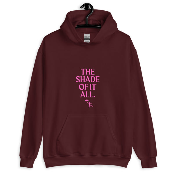 Front view of a maroon hoodie with pink “THE SHADE OF IT ALL.” lettering
