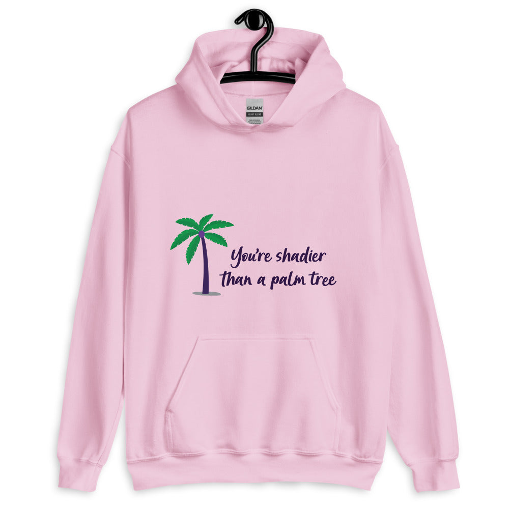 Front view of a pink hoodie with a palm tree and “You’re shadier than a palm tree” text