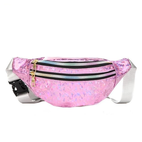 Close-up of a pink iridescent fanny pack with three zippered compartments and a white strap